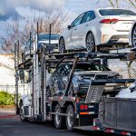 The Benefits of Enclosed vs. Open Auto Transport: Which is Right for  Your Car?