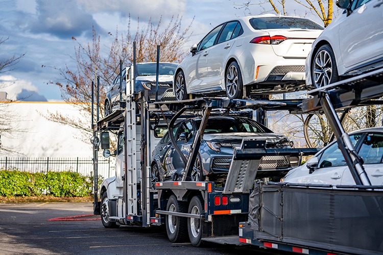 The Benefits Of Enclosed Vs. Open  Auto Transport: Which Is Right For  Your Car?